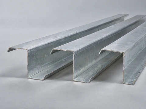 Three galvanized steel Z purlins showing the Z profile