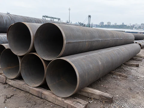 Large straight seam (LSAW) steel pipes stacked in a pipe yard
