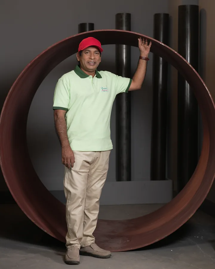 Mosharraf Karim, brand ambassador of Gram Bangla Tubes, standing inside a large diameter steel pipe